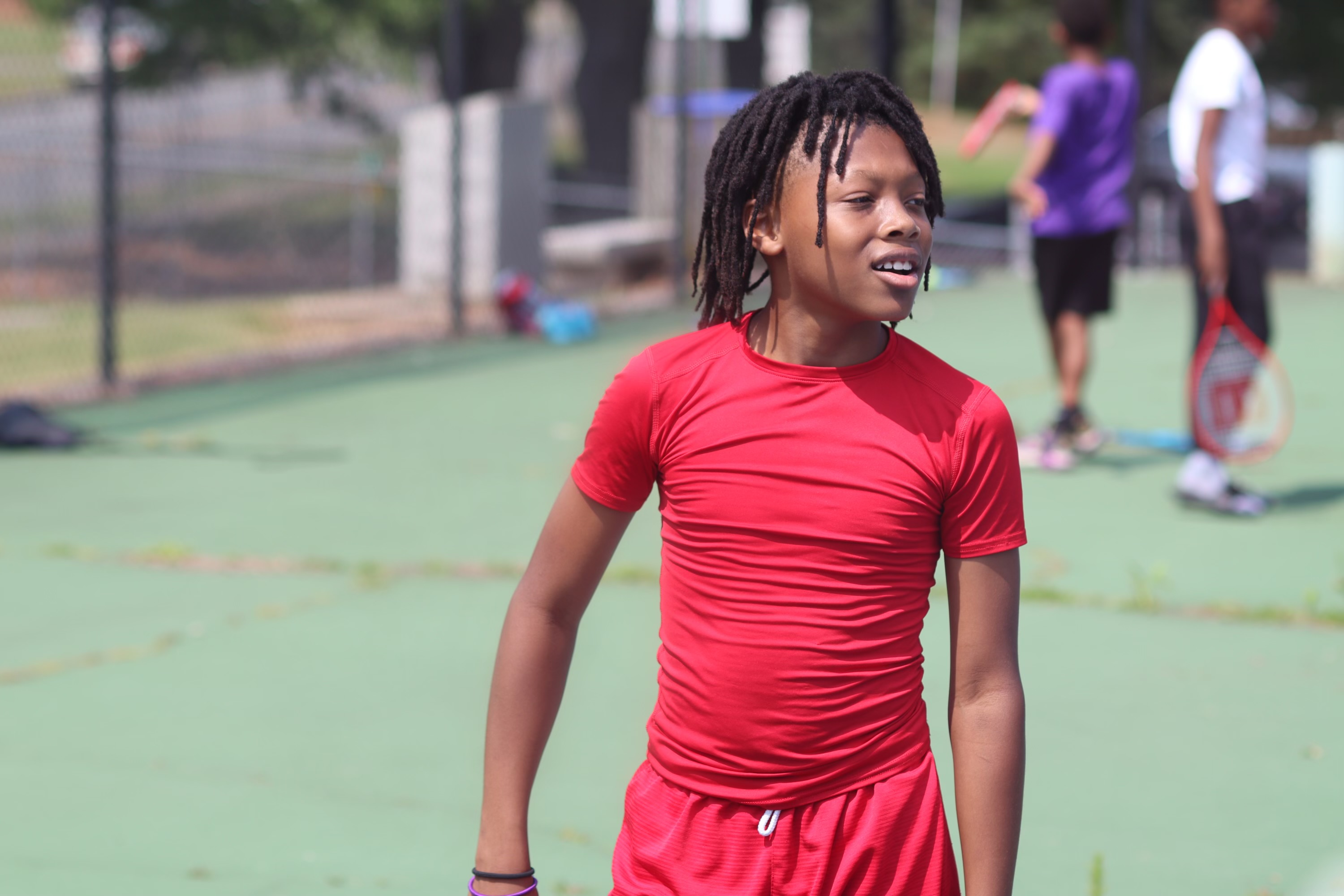 ELW youth at tennis camp